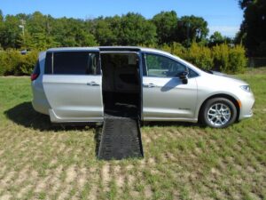 Silver Chrysler Pacifica with Driverge Side Entry Automatic Fold Out conversion