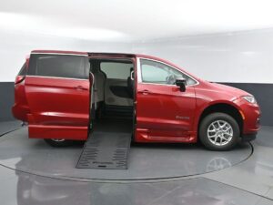 Red Chrysler Pacifica with BraunAbility Side Entry Automatic Fold Out conversion