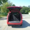 Red Dodge Grand Caravan with BraunAbility Side Entry Automatic Fold Out conversion