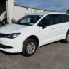 White Chrysler Voyager with FR Conversions Rear Entry Manual Fold Out conversion