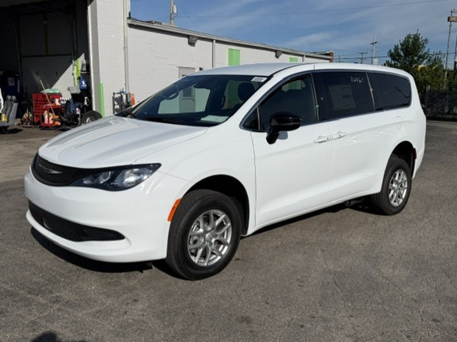 White Chrysler Voyager with FR Conversions Rear Entry Manual Fold Out conversion