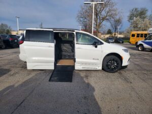 White Chrysler Pacifica with BraunAbility Side Entry Automatic Fold Out conversion