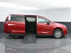 Red Chrysler Pacifica with BraunAbility Side Entry Manual Fold Out conversion