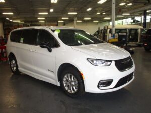 White Chrysler Pacifica with BraunAbility Side Entry Automatic Fold Out conversion