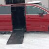 Red Chrysler Pacifica with Driverge Side Entry Automatic Fold Out conversion