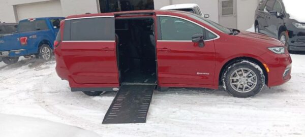 Red Chrysler Pacifica with Driverge Side Entry Automatic Fold Out conversion
