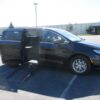 Black Chrysler Pacifica with Driverge Side Entry Automatic Fold Out conversion