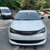 White Chrysler Voyager with Driverge Side Entry Automatic Fold Out conversion