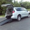 Silver Chrysler Voyager with BraunAbility Rear Entry Manual Fold Out conversion