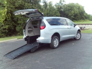 Silver Chrysler Voyager with BraunAbility Rear Entry Manual Fold Out conversion