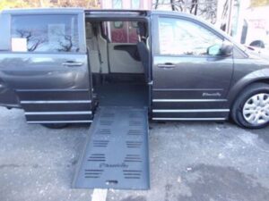 Grey Dodge Grand Caravan with BraunAbility Side Entry Manual Fold Out conversion