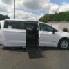 White Chrysler Voyager with Driverge Side Entry Automatic Fold Out conversion