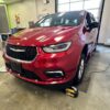 Red Chrysler Pacifica with BraunAbility Side Entry Automatic In Floor conversion