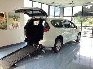 White Chrysler Pacifica with BraunAbility Rear Entry Manual Fold Out conversion