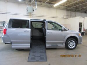 Silver Dodge Grand Caravan with BraunAbility Side Entry Automatic Fold Out conversion