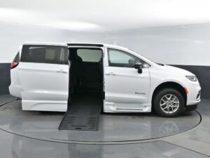 White Chrysler Pacifica with BraunAbility Side Entry Automatic Fold Out conversion
