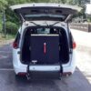White Chrysler Pacifica with Driverge Rear Entry Manual Fold Out conversion