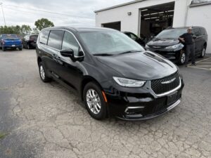 Black Chrysler Pacifica with ATS Rear Entry Manual Fold Out conversion