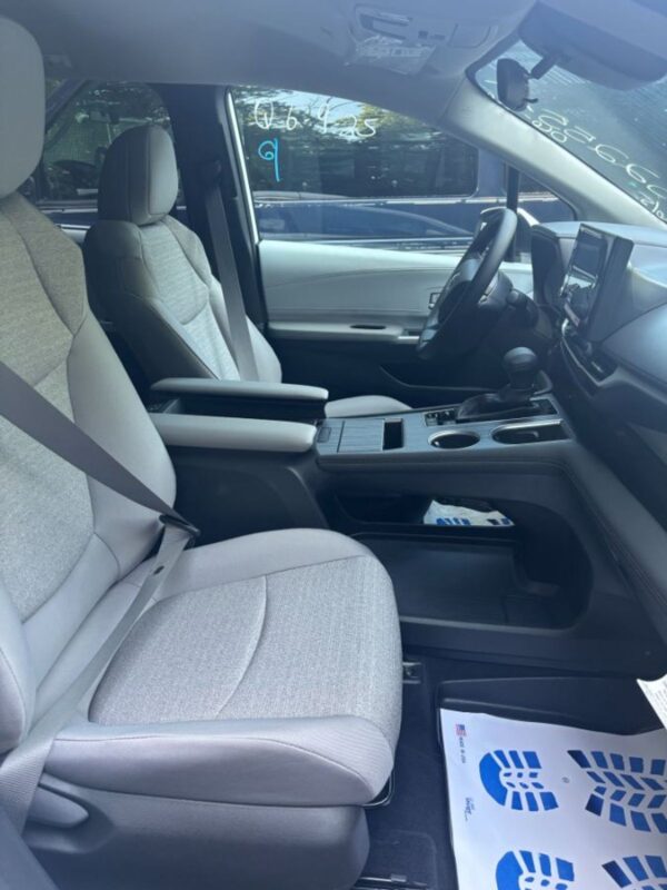 White Toyota Sienna with BraunAbility Rear Entry Manual Fold Out conversion
