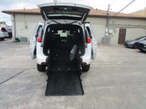 White Chrysler Voyager with FR Conversions Rear Entry Manual Fold Out conversion