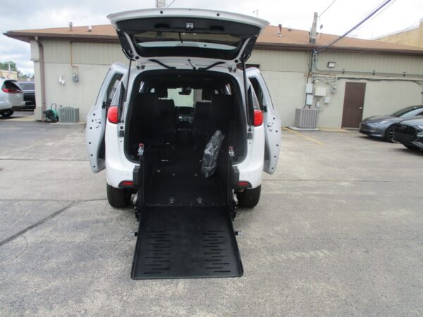 White Chrysler Voyager with FR Conversions Rear Entry Manual Fold Out conversion