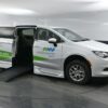 White Chrysler Voyager with BraunAbility Side Entry Automatic Fold Out conversion