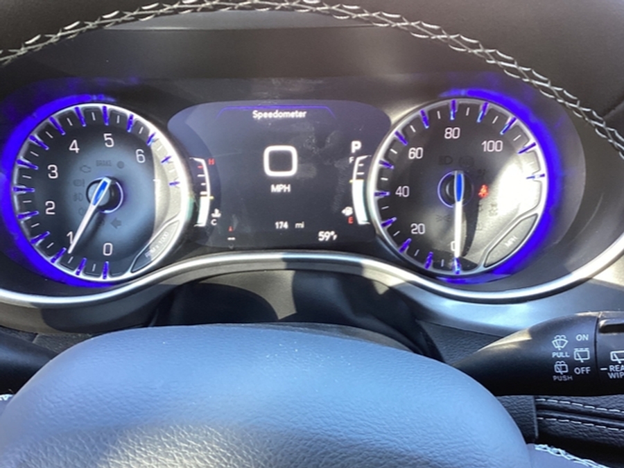 Blue Chrysler Pacifica with Driverge Side Entry Automatic Fold Out conversion