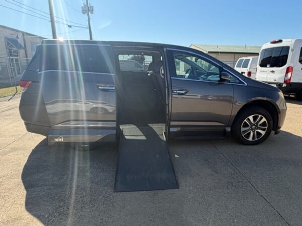 Brown Honda Odyssey with Vantage Mobility Side Entry Automatic In Floor conversion