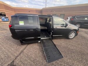 Black Chrysler Voyager with Driverge Side Entry Automatic Fold Out conversion