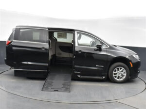 Black Chrysler Voyager with BraunAbility Side Entry Automatic Fold Out conversion