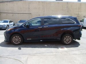 Blue Toyota Sienna with Driverge Rear Entry Manual Fold Out conversion