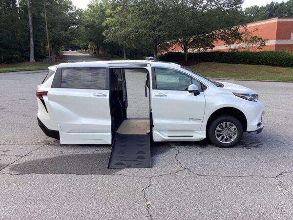 White Toyota Sienna with BraunAbility Side Entry Automatic Fold Out conversion