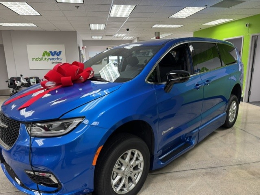 Blue Chrysler Pacifica with BraunAbility Side Entry Automatic Fold Out conversion