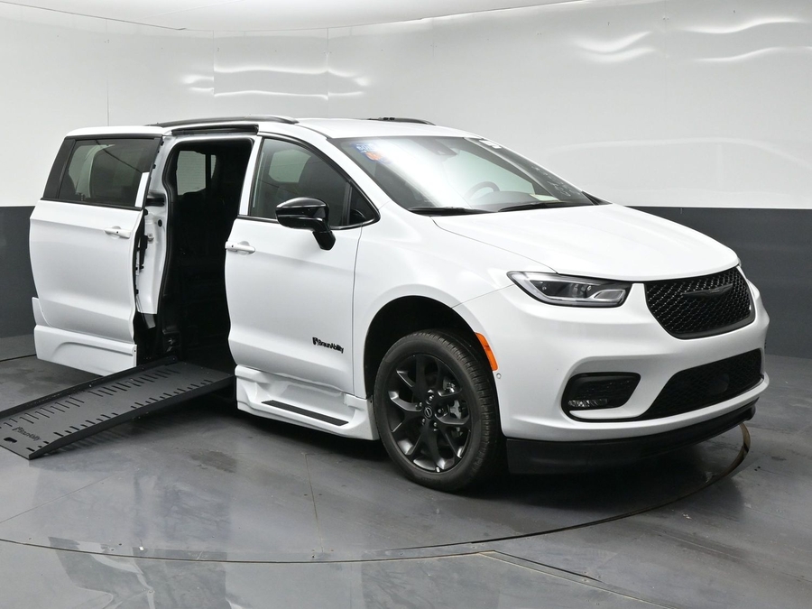 White Chrysler Pacifica with BraunAbility Side Entry Automatic Fold Out conversion