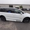 White Chrysler Pacifica with BraunAbility Side Entry Automatic Fold Out conversion