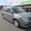 Silver Dodge Grand Caravan with Adaptive Vans Side Entry Automatic Fold Out conversion