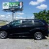 Black Toyota Sienna with Driverge Rear Entry Manual Fold Out conversion