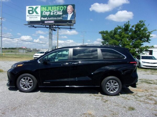 Black Toyota Sienna with Driverge Rear Entry Manual Fold Out conversion