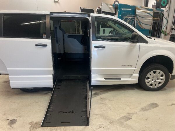 White Dodge Grand Caravan with BraunAbility Side Entry Manual Fold Out conversion