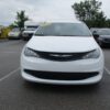 White Chrysler Voyager with Driverge Rear Entry Manual Fold Out conversion