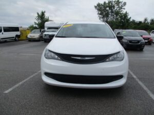 White Chrysler Voyager with Driverge Rear Entry Manual Fold Out conversion