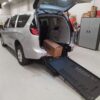 Silver Chrysler Pacifica with BraunAbility Rear Entry Manual Fold Out conversion