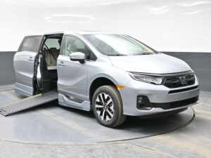 Silver Honda Odyssey with BraunAbility Side Entry Automatic In Floor conversion
