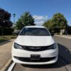 White Chrysler Voyager with BraunAbility Rear Entry Manual Fold Out conversion