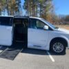 White Dodge Grand Caravan with BraunAbility Side Entry Automatic Fold Out conversion