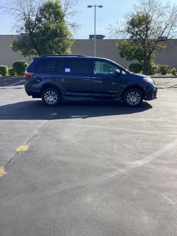 Blue Toyota Sienna with BraunAbility Side Entry Automatic Fold Out conversion