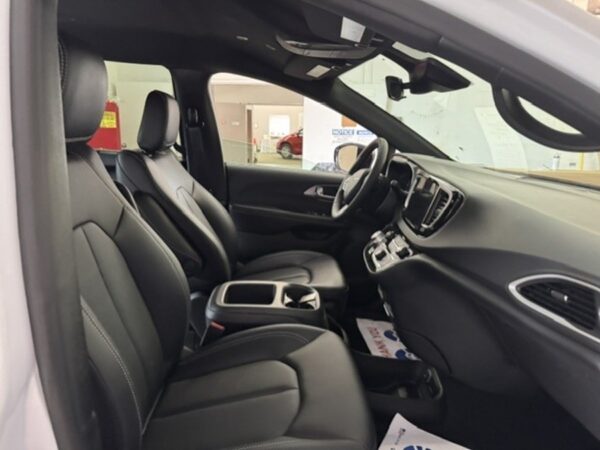 White Chrysler Voyager with BraunAbility Rear Entry Manual Fold Out conversion