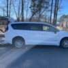White Chrysler Voyager with Driverge Rear Entry Manual Fold Out conversion