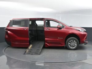 Red Toyota Sienna with BraunAbility Side Entry Automatic Fold Out conversion