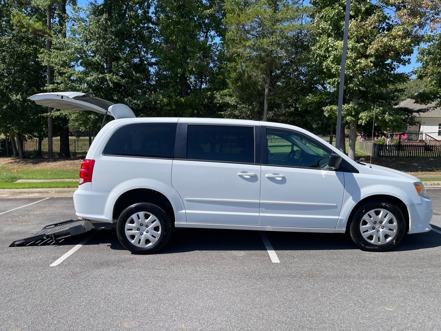 White Dodge Grand Caravan with FR Conversions Rear Entry Manual Fold Out conversion